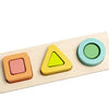 Színes, geometrikus fa formaibellesztő játék, kellemes pasztell színekben